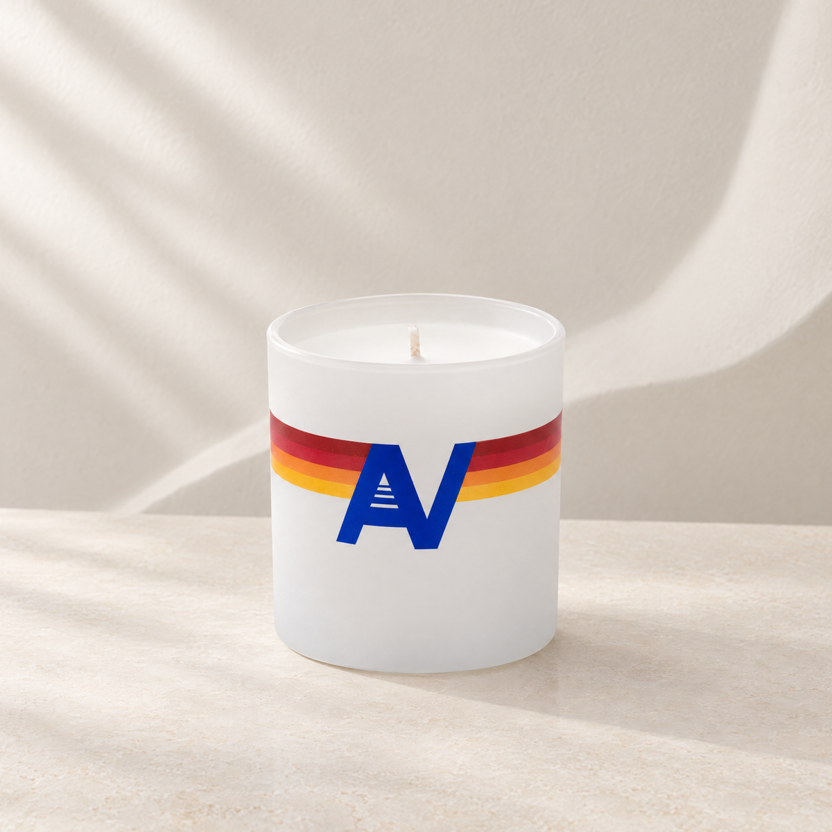 Matte white 9 oz. Classic Printed Candle with a custom printed logo, unlit.