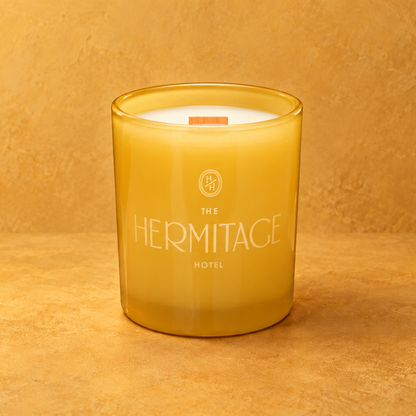 Yellow 14 oz. Luxury Engraved Candle with a custom engraved logo, unlit.