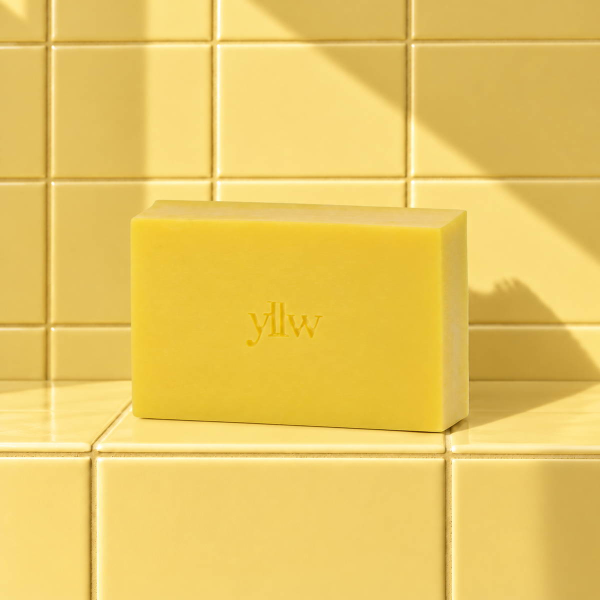 Yellow rectangle bar soap laser engraved with a brand logo, 3.25 oz