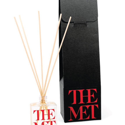 2 oz mini reed diffuser in clear glass bottle with black gift box packaging