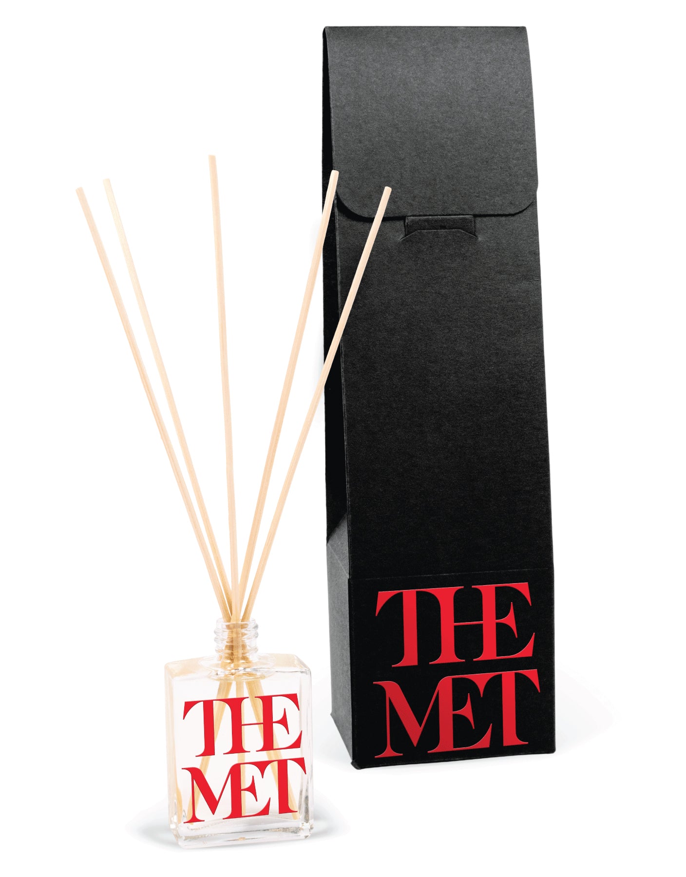 2 oz mini reed diffuser in clear glass bottle with black gift box packaging