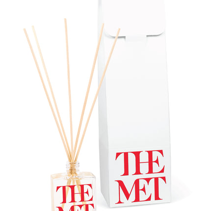 2 oz mini reed diffuser in clear glass bottle with white gift box packaging