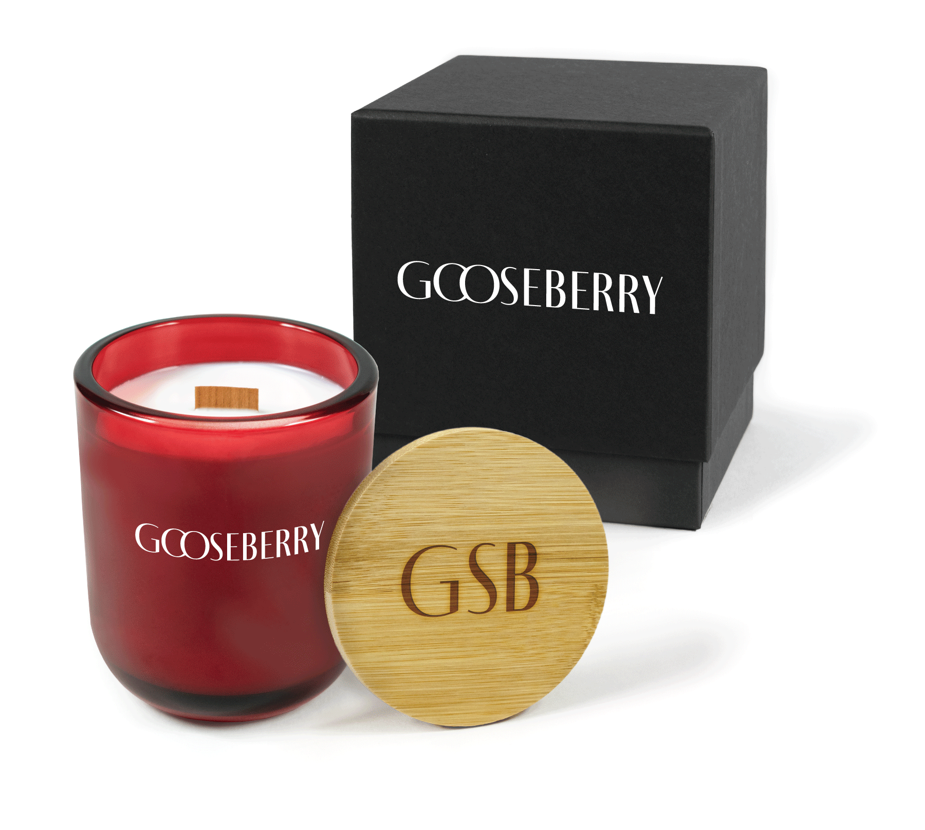 A 12 oz Luxe Custom Candle in the color “Blood Red” which is a vivid rouge red from Custom Candles LA. The candle features a wood wick and a white imprinted logo for “Gooseberry” on the front of the glass. Leaning against the side of the candle is a bamboo candle lid etched with “GSB”. In the background, there is a black 2-piece box 4-color printed with white “Gooseberry” logo.