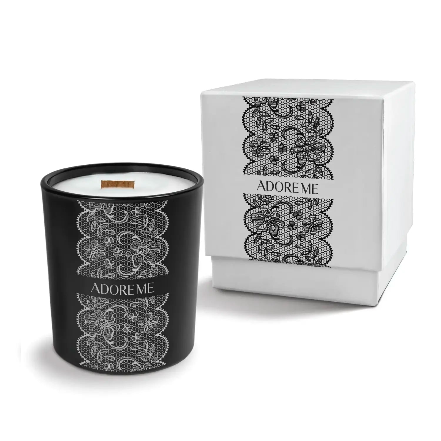 Luxury engraved candle with branding next to a box on a white background