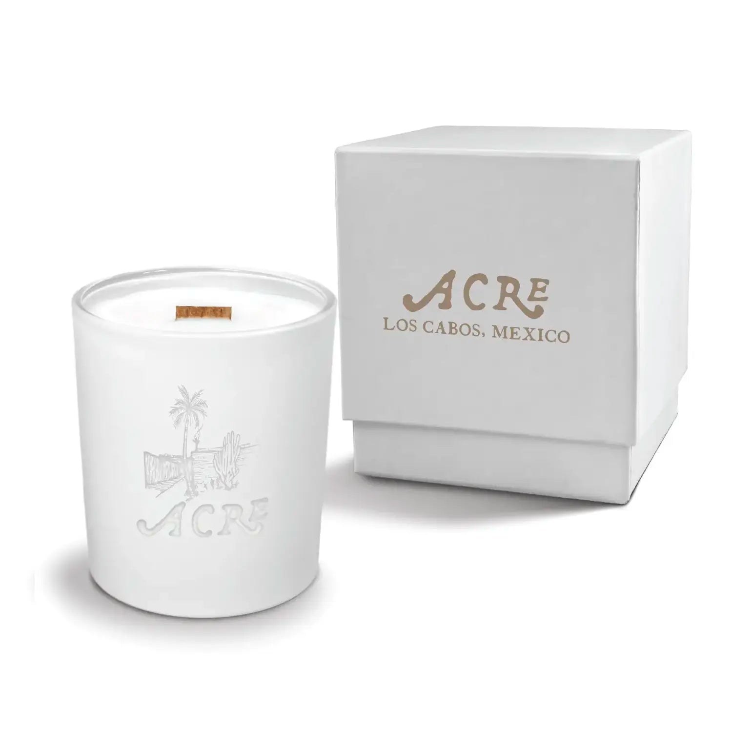 Luxury engraved candle with branding next to a box on a white background
