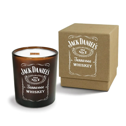Luxury engraved candle with branding next to a box on a white background