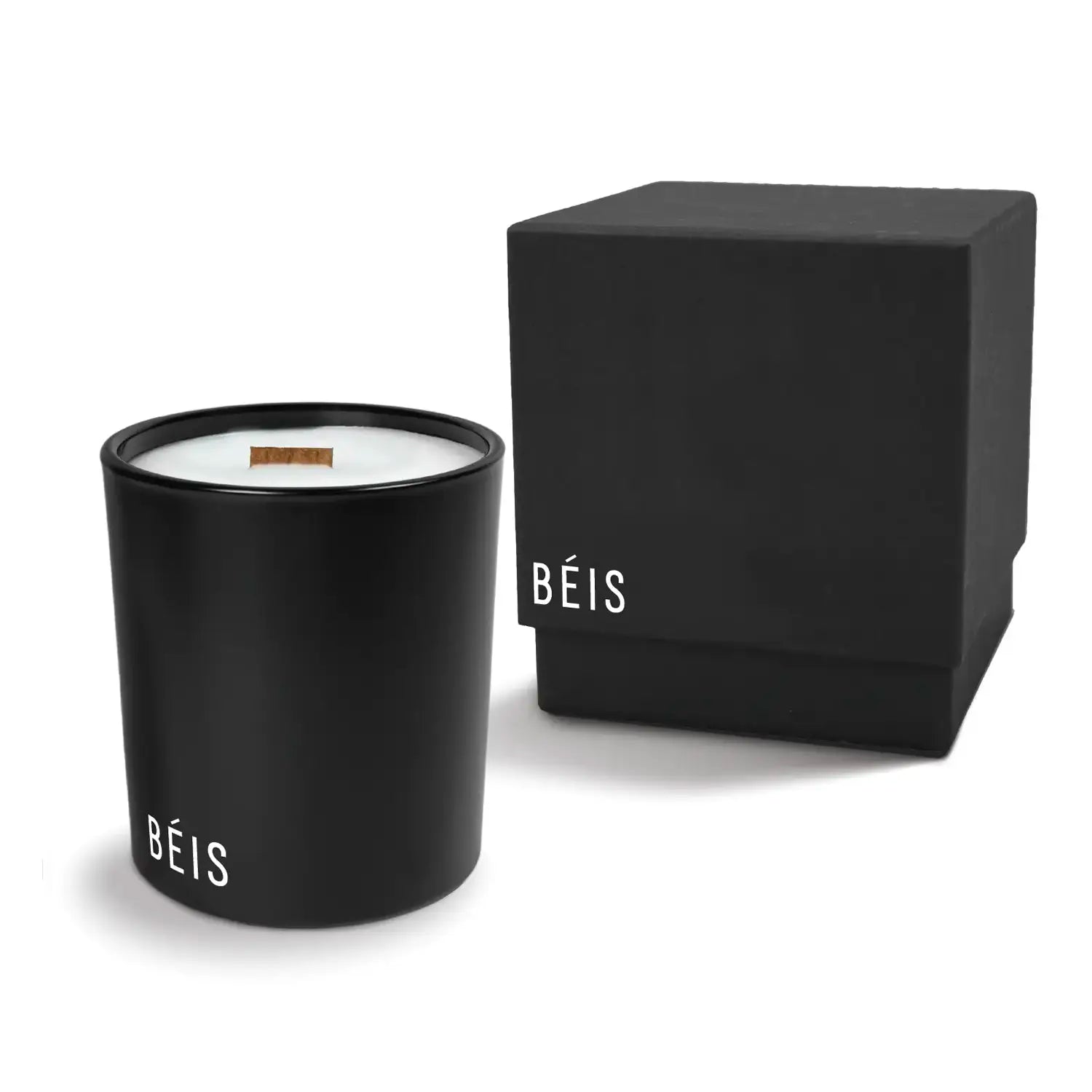 Luxury Black candle with branding next to a matching black box on a white background