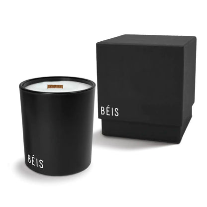 Luxury Black candle with branding next to a matching black box on a white background