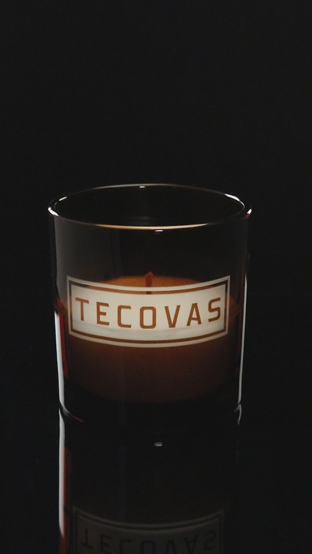 Glossy Amber 9 oz. Classic Engraved Candle burning.