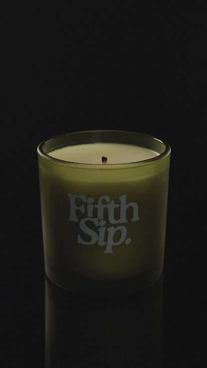 Green 9 oz. Classic Printed Candle burning.