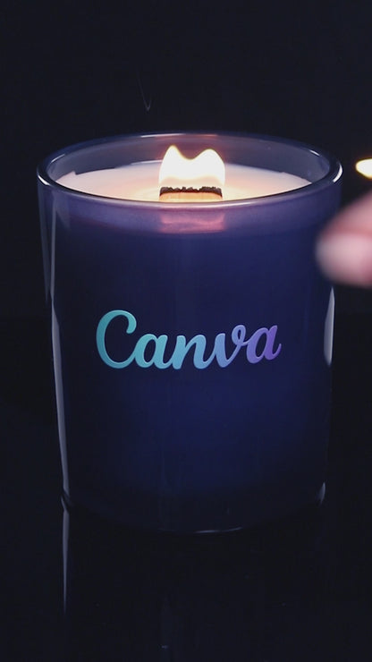Blue 14 oz. Luxury Printed Candle burning.