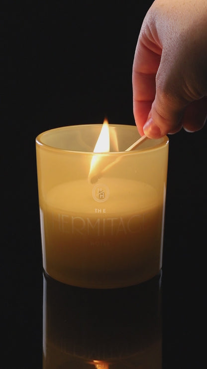 Yellow 9 oz. Classic Engraved Candle burning.