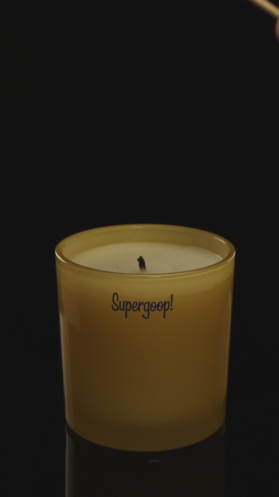 Yellow 9 oz. Classic Printed Candle burning.