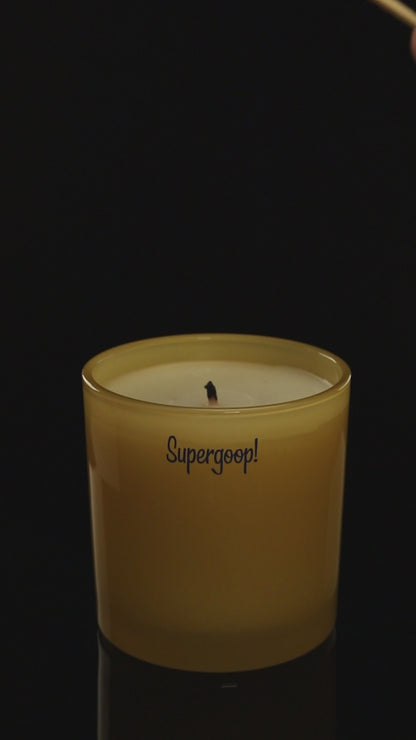 Yellow 9 oz. Classic Printed Candle burning.