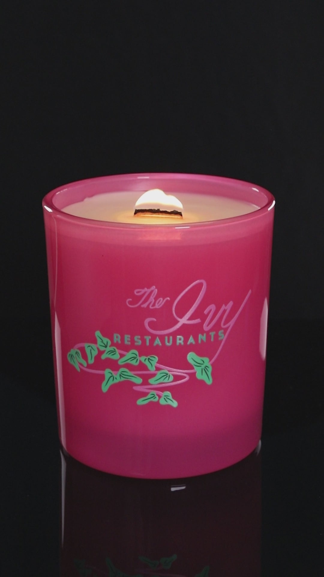 Pink 14 oz. Luxury Printed Candle burning.
