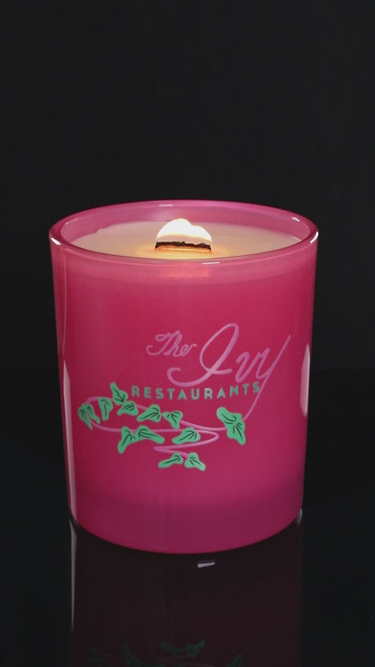 Pink 14 oz. Luxury Printed Candle burning.