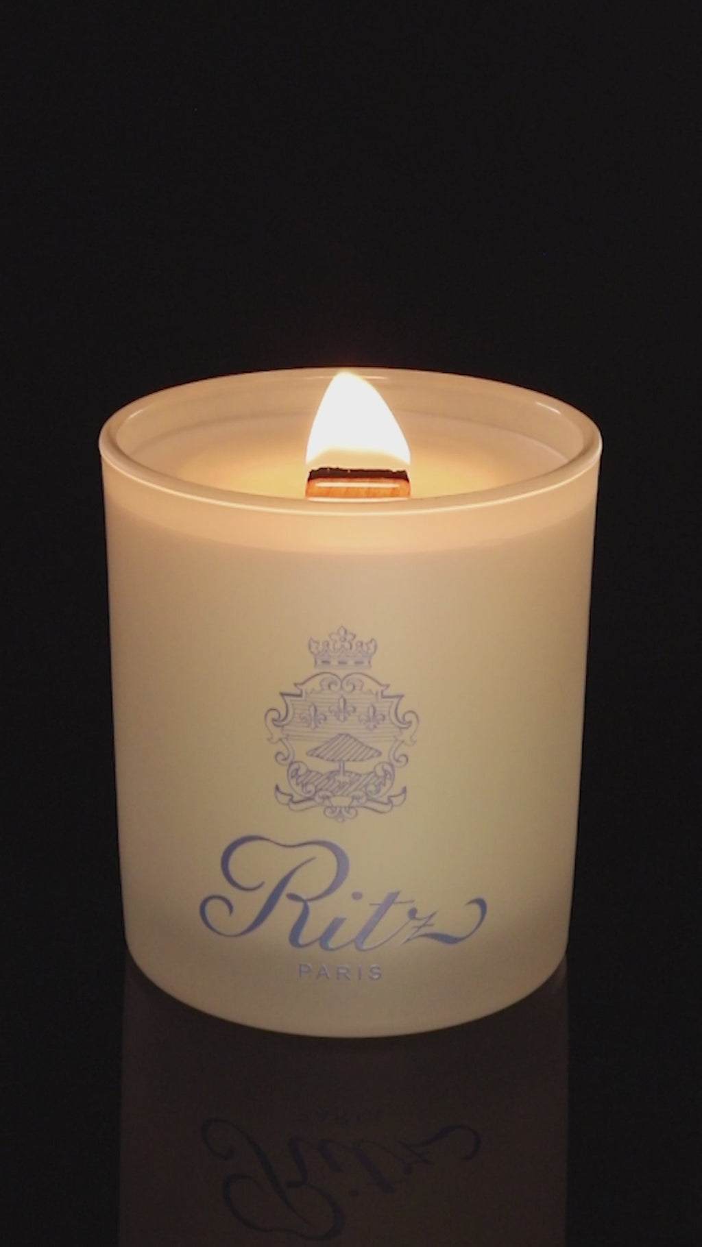 Ivory 14 oz. Luxury Printed Candle burning.