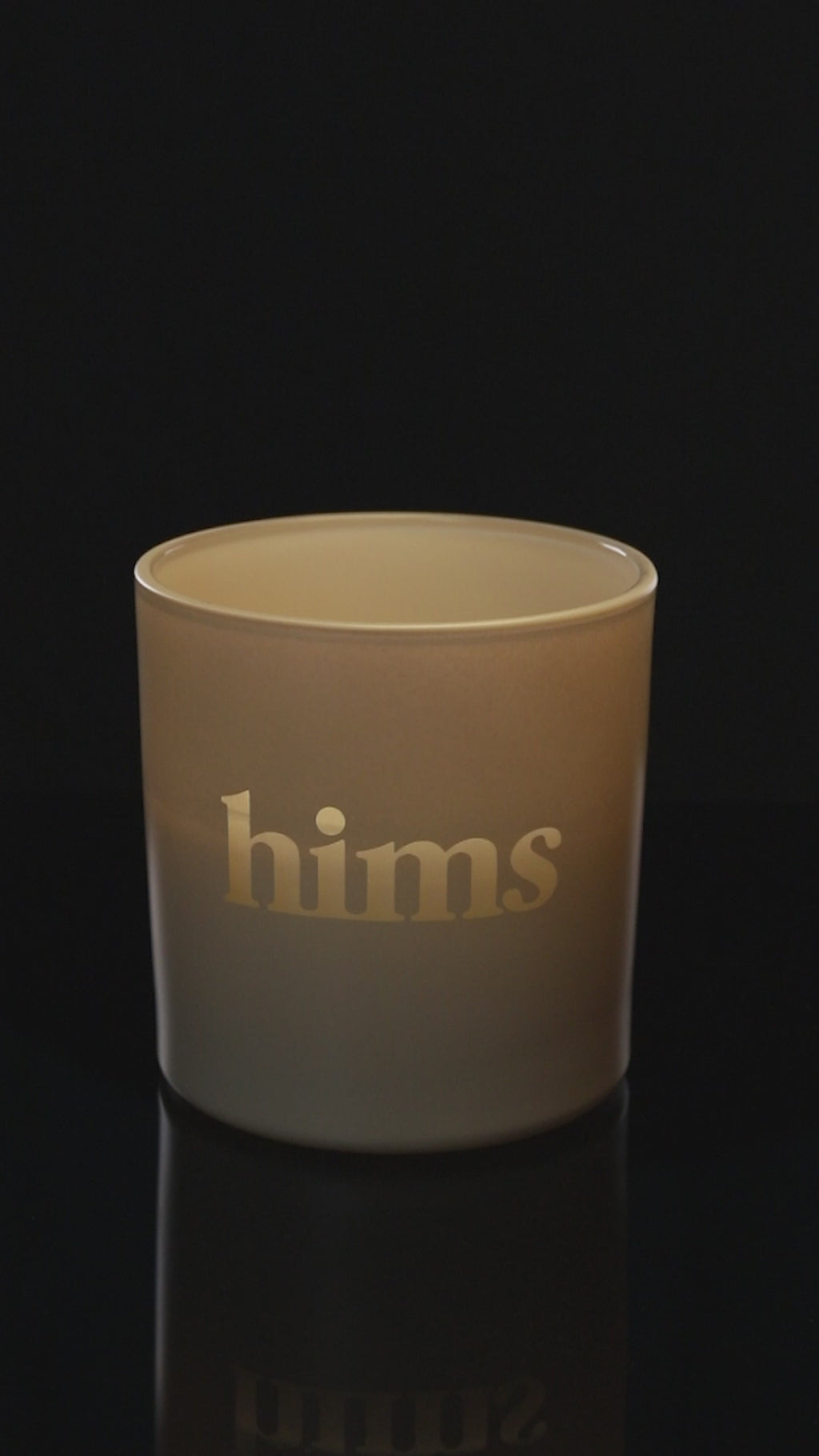 Nude 9 oz. Classic Engraved Candle burning.