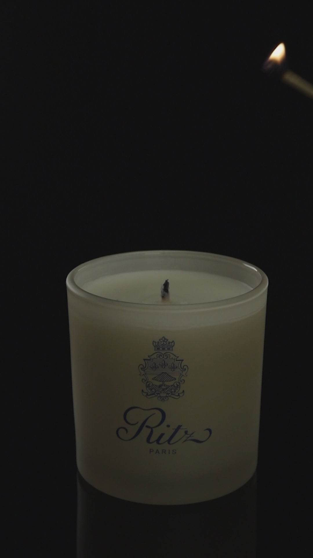 Ivory 9 oz. Classic Printed Candle burning.