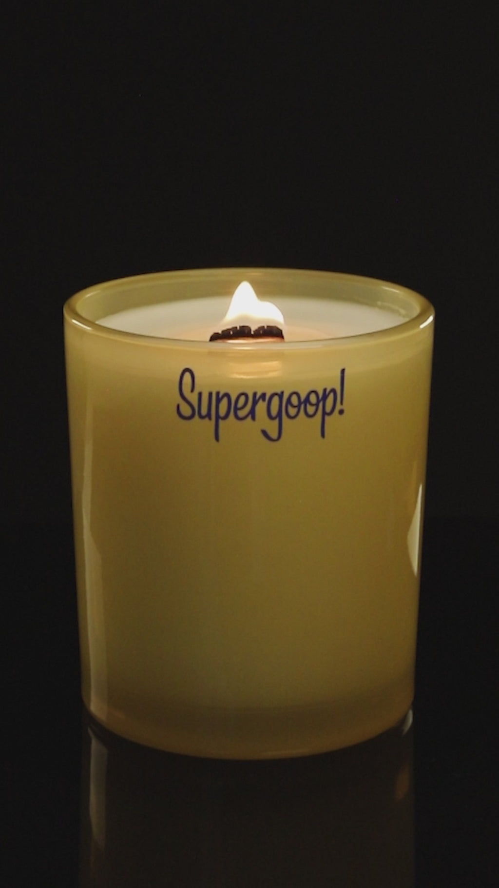 Yellow 14 oz. Luxury Printed Candle burning.