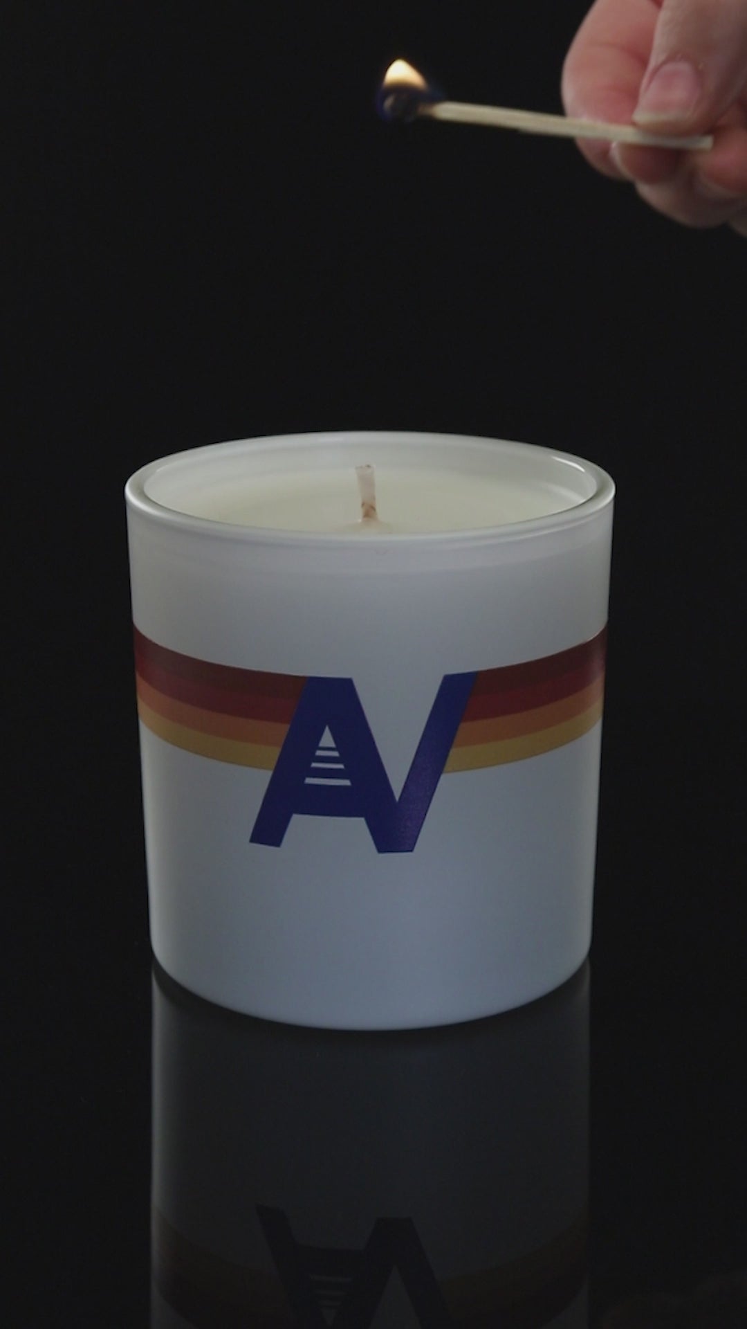 Matte White 9 oz. Classic Printed Candle burning.