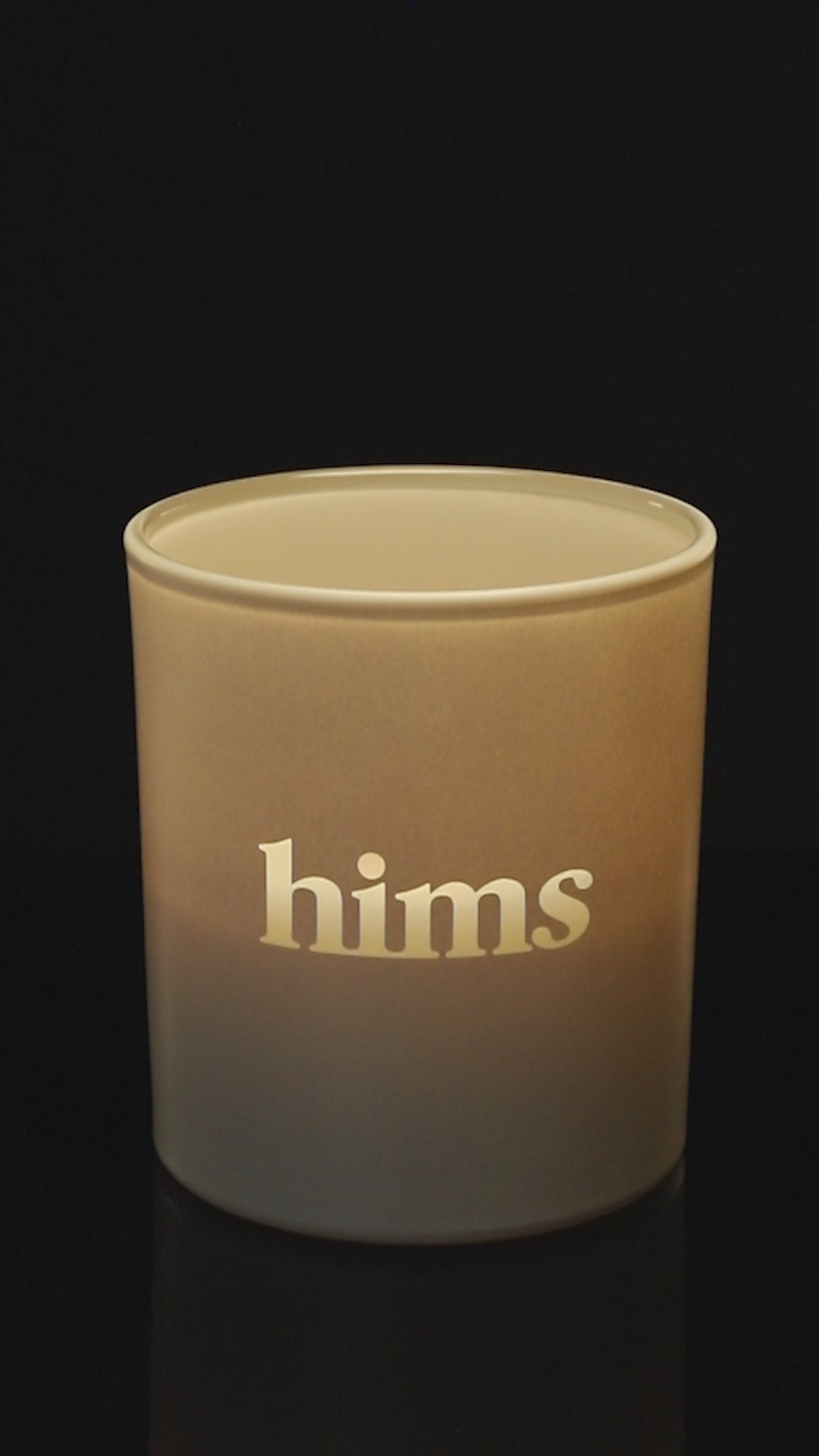 Nude 14 oz. Luxury Engraved Candle burning.