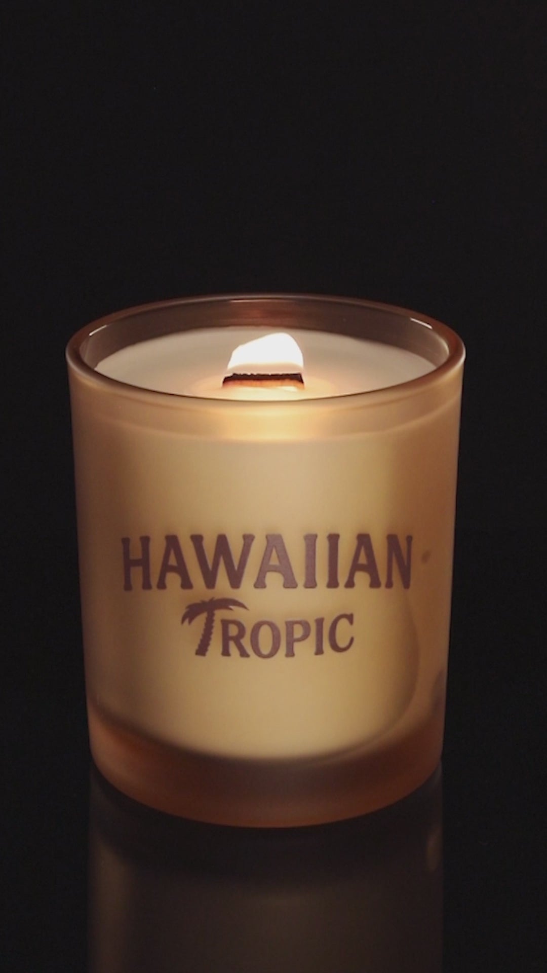 Sand 14 oz. Luxury Printed Candle burning.