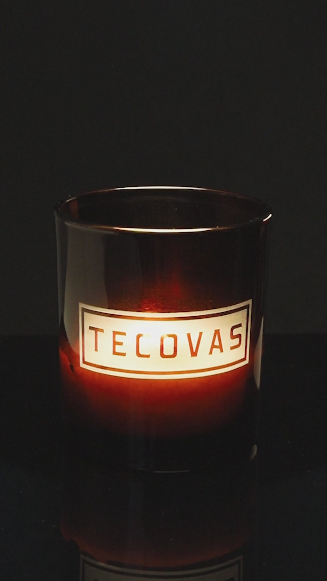 Glossy Amber 14 oz. Luxury Engraved Candle burning.