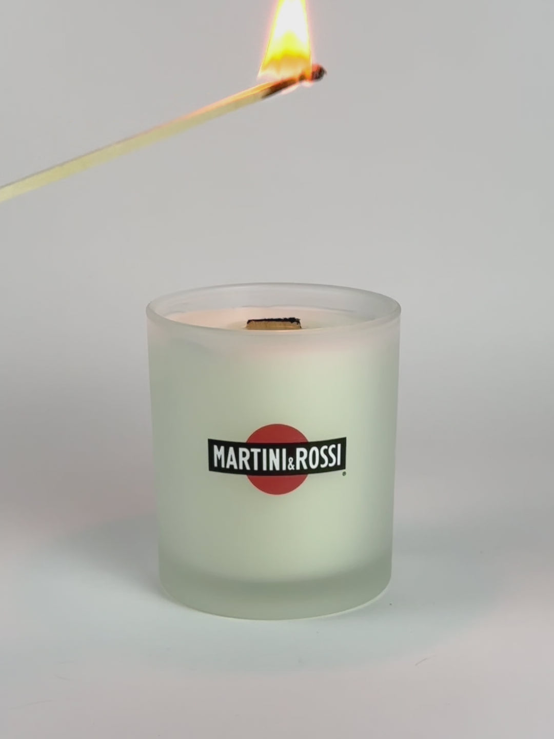 Frosted Luxury Printed Candle being lit product shot.