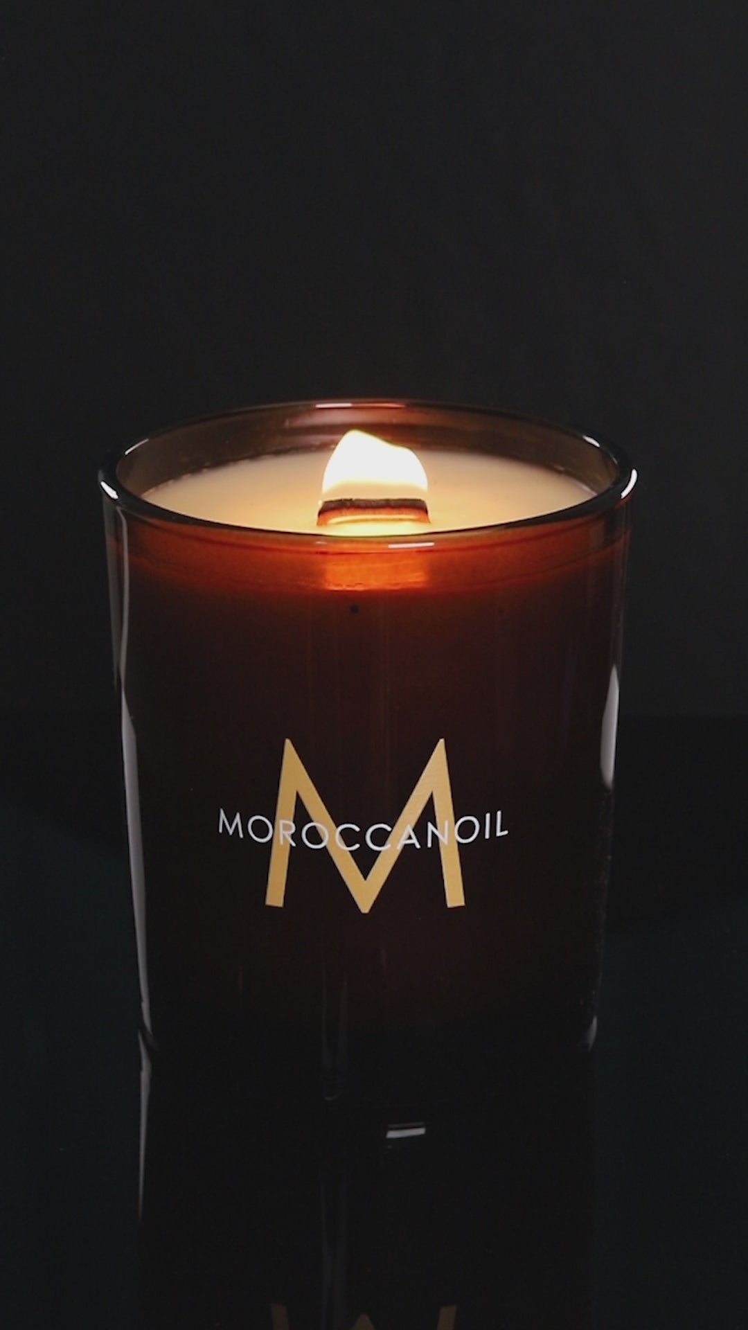 Glossy Amber 14 oz. Luxury Printed Candle burning.