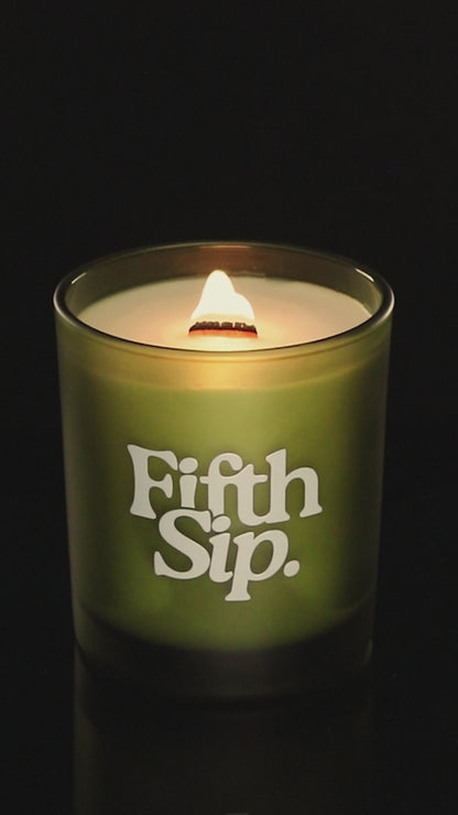 Green 14 oz. Luxury Printed Candle burning.