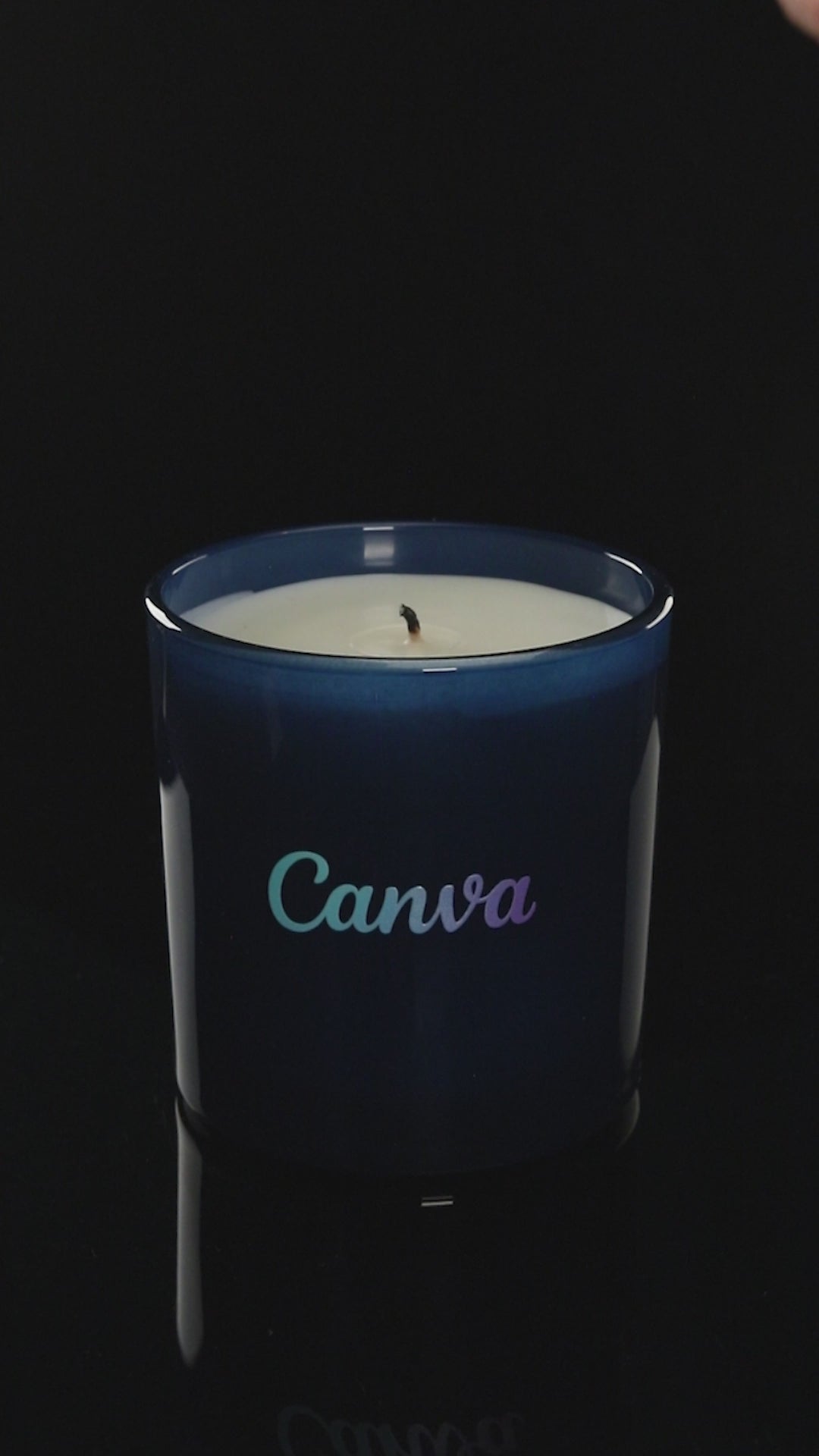 Blue 9 oz. Classic Printed Candle burning.