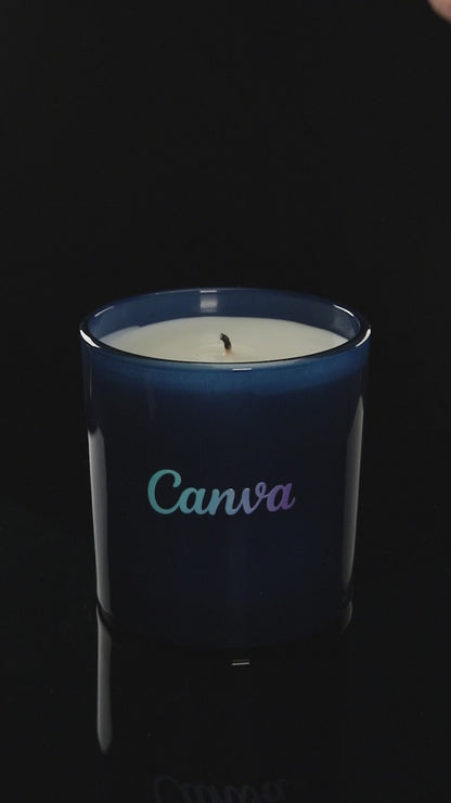 Blue 9 oz. Classic Printed Candle burning.