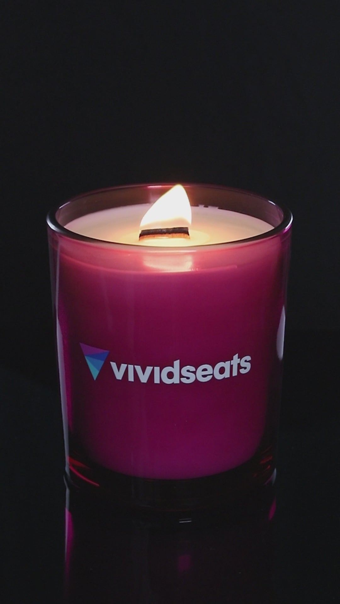 Purple 14 oz. Luxury Printed Candle burning.