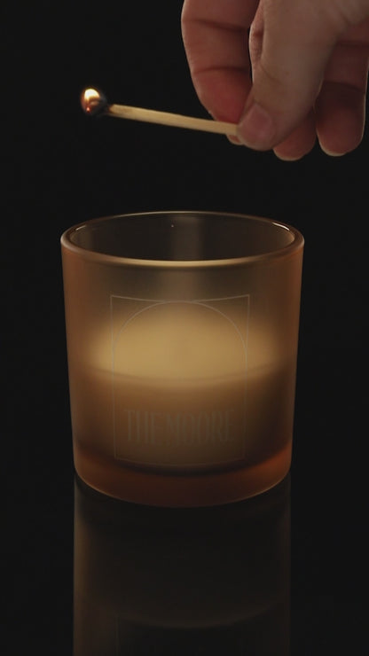 Sand 9 oz. Classic Engraved Candle burning.