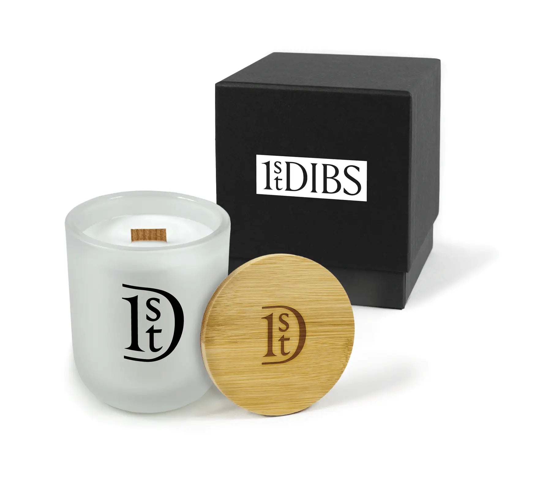 White candle with wooden lid and black box featuring logo on a white background